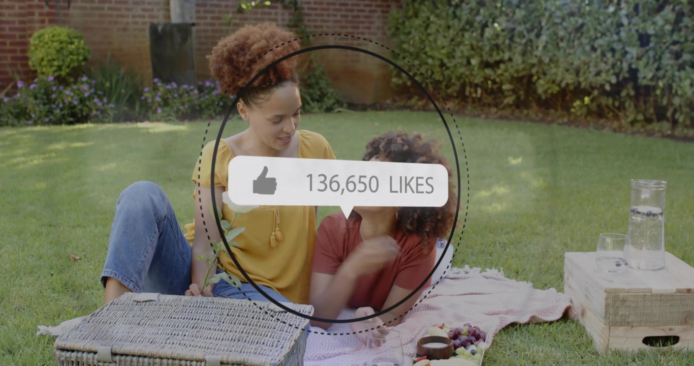 Mother plucking white flower for daughter fueling social media like counter surging across picnic