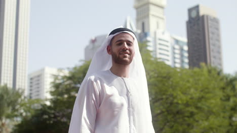 man with arabic clothing in the street