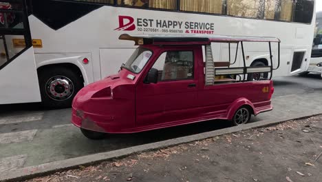 red vehicle unfolds into a food truck