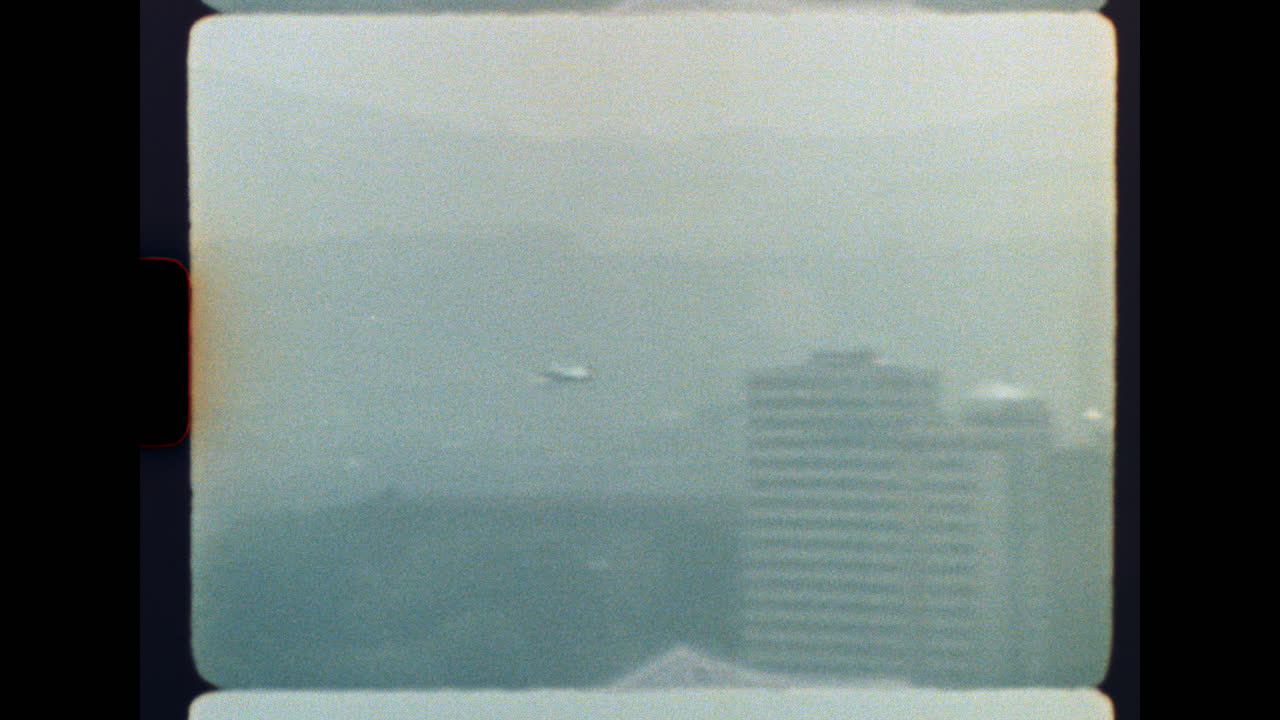 Cityscape in Fog with Airplane