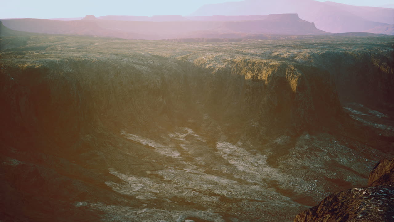 Majestic canyon landscape during sunrise with soft light over rocky terrain