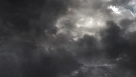 Lightning-thunderstorm-flash-in-the-gray-clouds