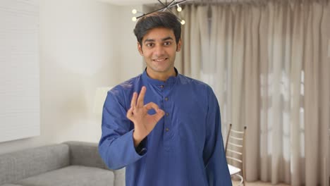 Happy-Indian-man-showing-okay-sign