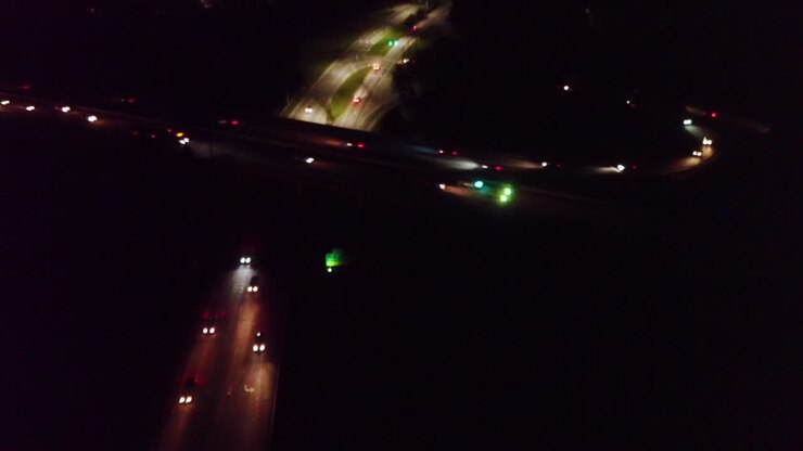 Overhead drone view of nighttime busy highway traffic Raleigh North Carolina