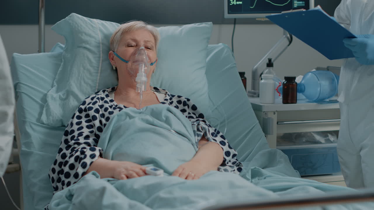 Elder woman receiving medical assistance from paramedics