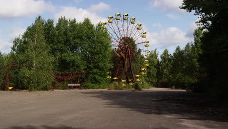 pripyat ferris wheel in abandoned amusement park, distance zoom out view