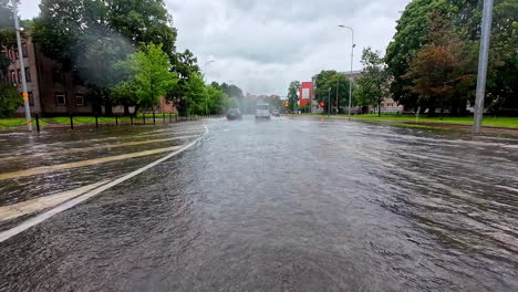driving through flooded street in jelgava latvia