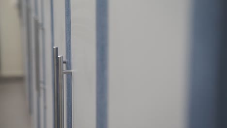 close-up view of kitchen cabinets with handles