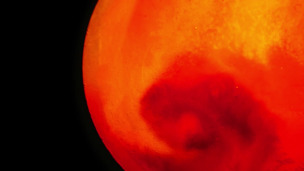 움직이는 표면이 넓은 추상 빨강 및 녹색 행성