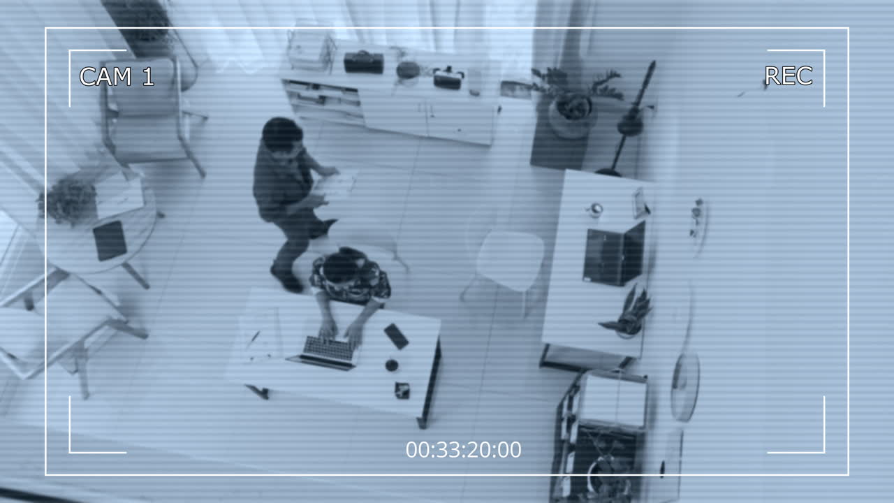 CCTV of Coworkers Networking in Office
