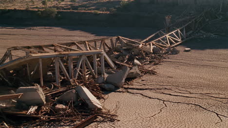 collapsed bridge in a dry riverbed