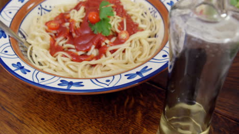 Table-set-for-dinner-with-spaghetti-and-salad