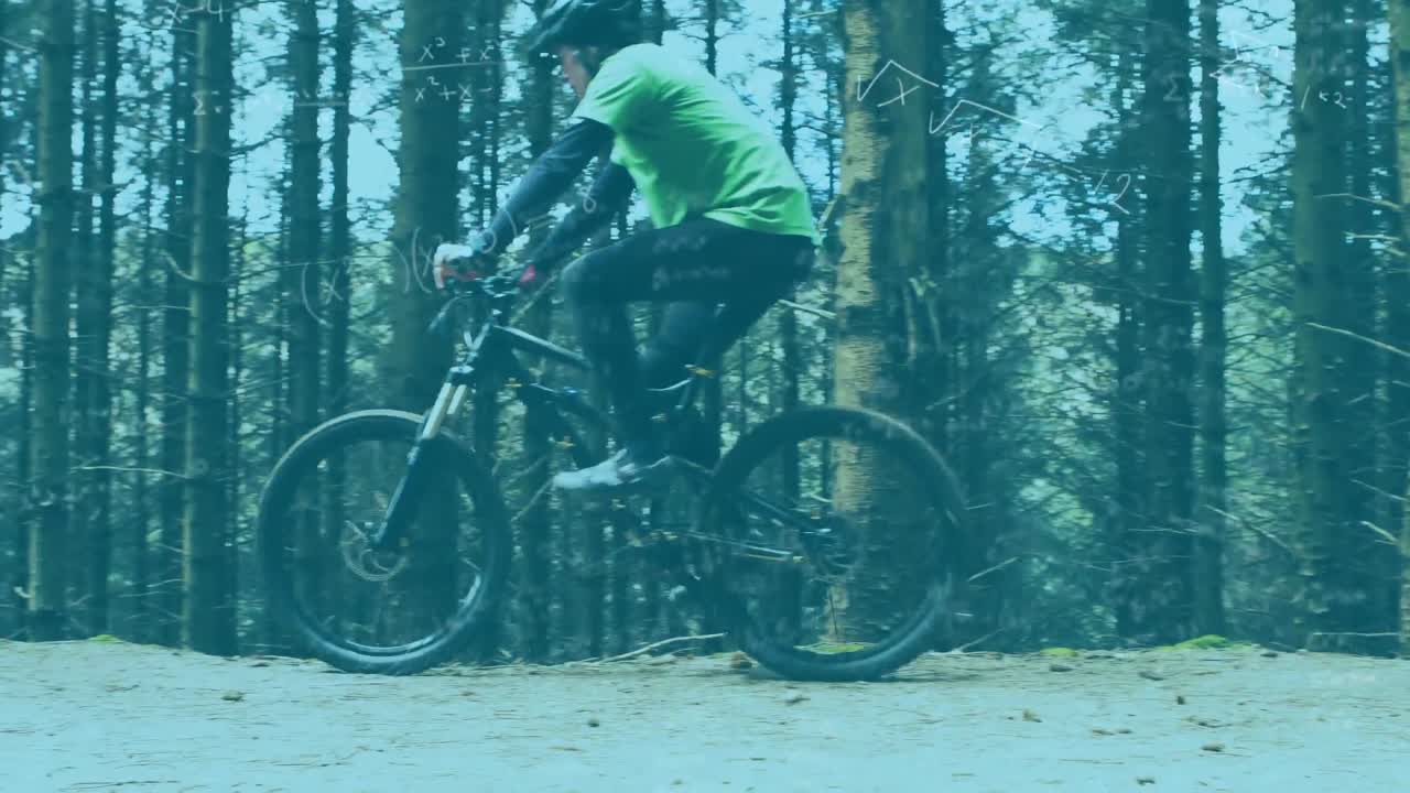 ecuaciones matemáticas contra el hombre en bicicleta en el bosque