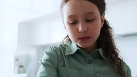 girl eating a cookie