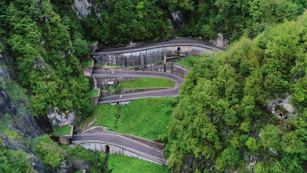 Dramatic overhead shot of steep switchbacks on historic San Boldo pass, Italy