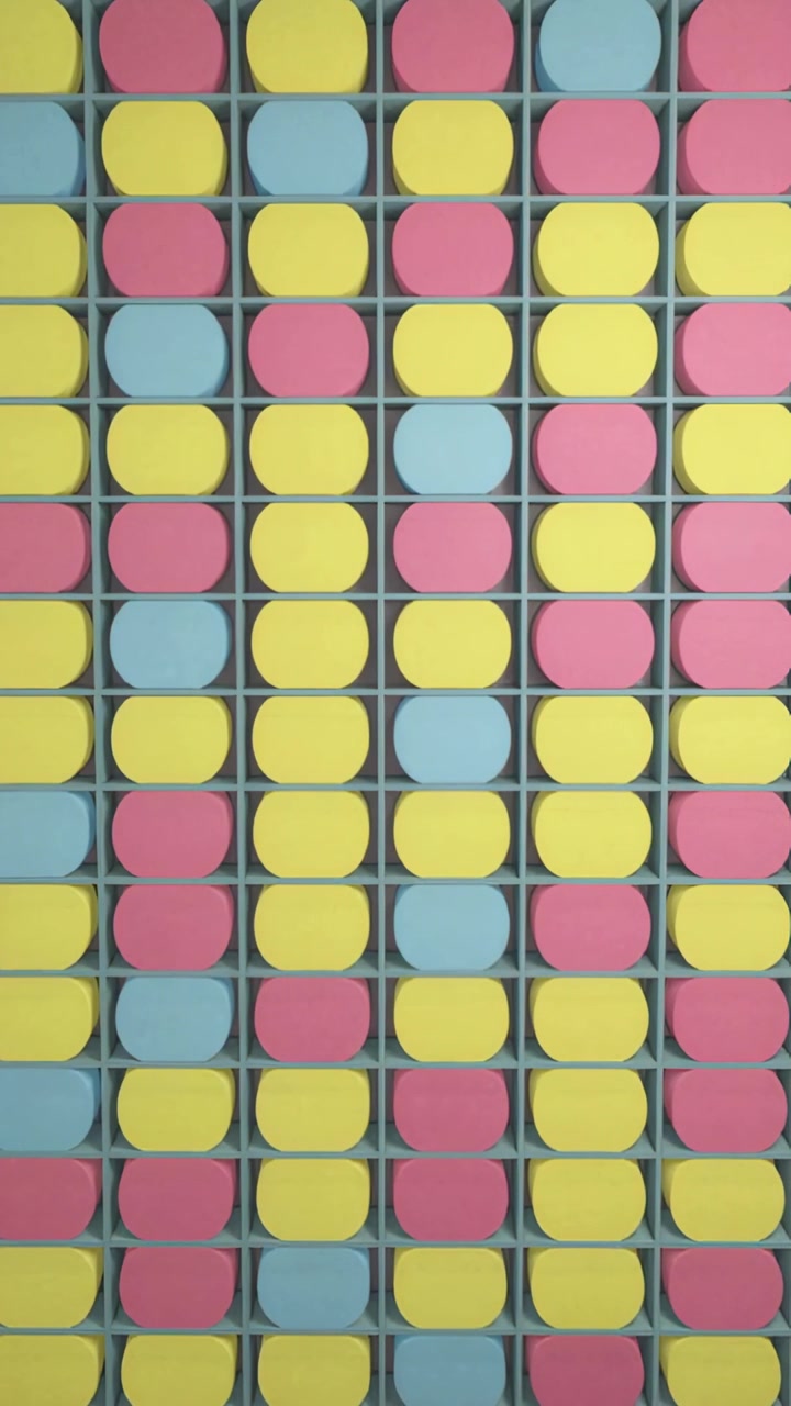 Vertical video: Drifting camera revealing colored panel grid on wall, highlighting yellow pink blue