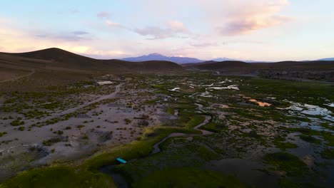 twilight hues over chilean wetlands with andes backdrop, aerial view