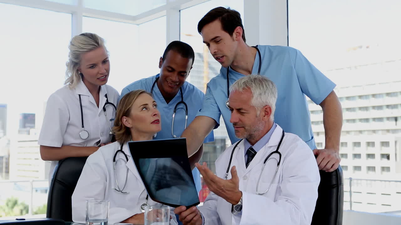 Group of doctors examining an xray