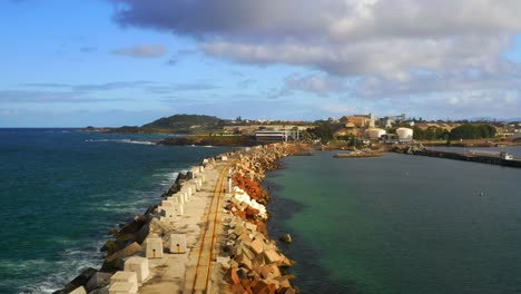 Scenic-Rocky-Pathway-Near-The-Coast-Of-Wollongong-New-South-Wales,-Australia---aerial-shot