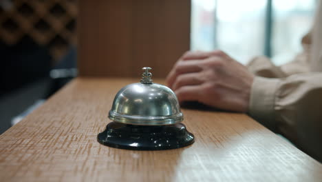 hotel reception desk with bell and payment