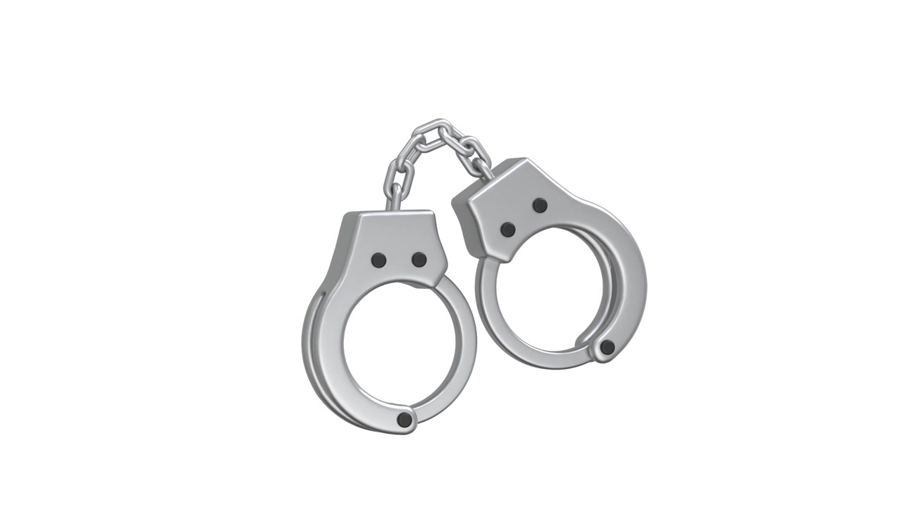 Manette di metallo rotanti su sfondo bianco