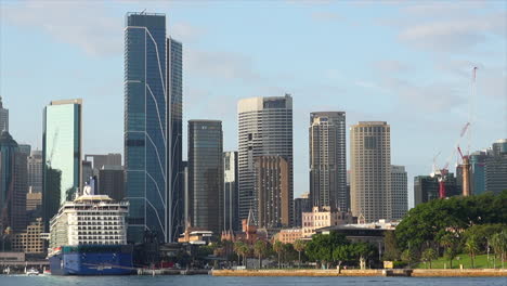 a large cruise ship docked at circular quay in sydney australia