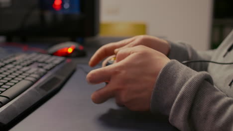 Close-up-of-wireless-joystick-during-online-championship