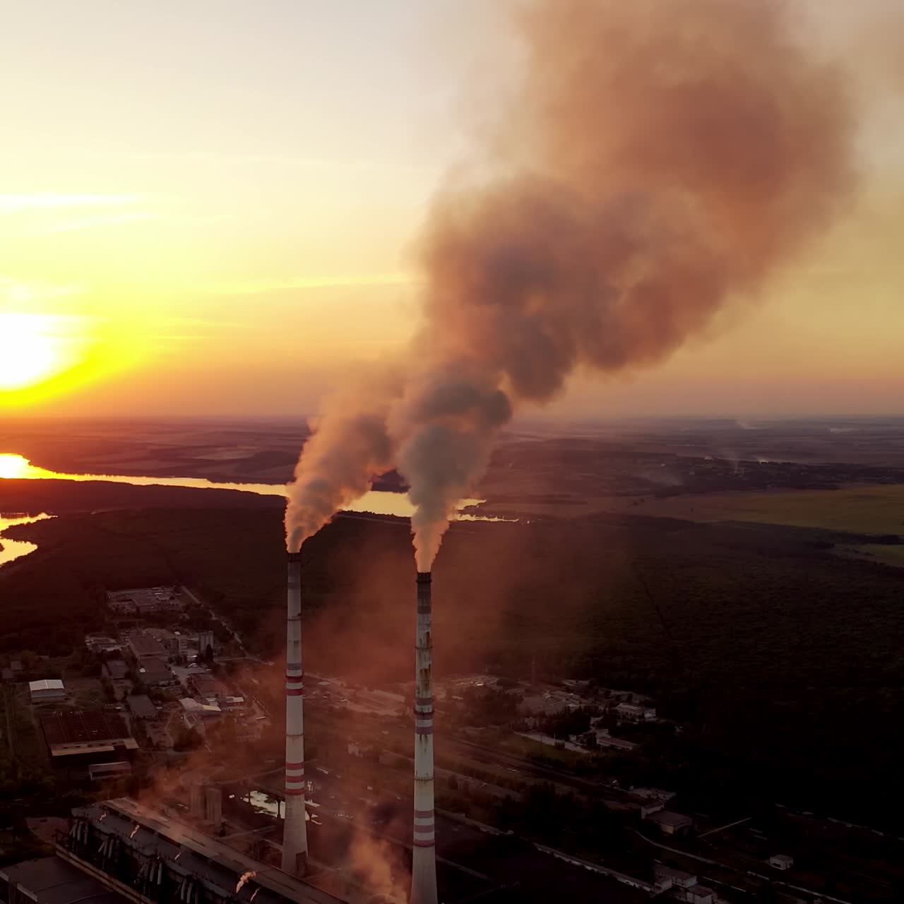 Aerial view of pipes with smoke