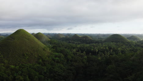 Dynamic-aerial-of-the-Chocolate-Hills,-Carmen-Philippines