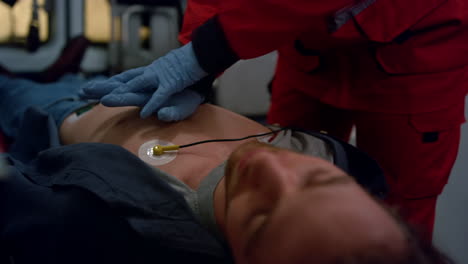 ambulance paramedic hands performing heart massage