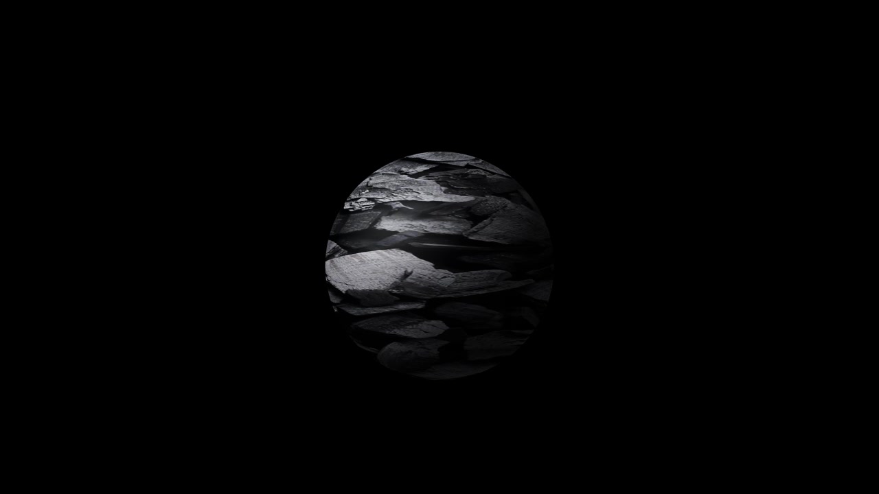 Slowly Rotating Rough Black Rock Textured Sphere on Black Background