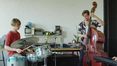 jazz musicians playing instruments in a studio
