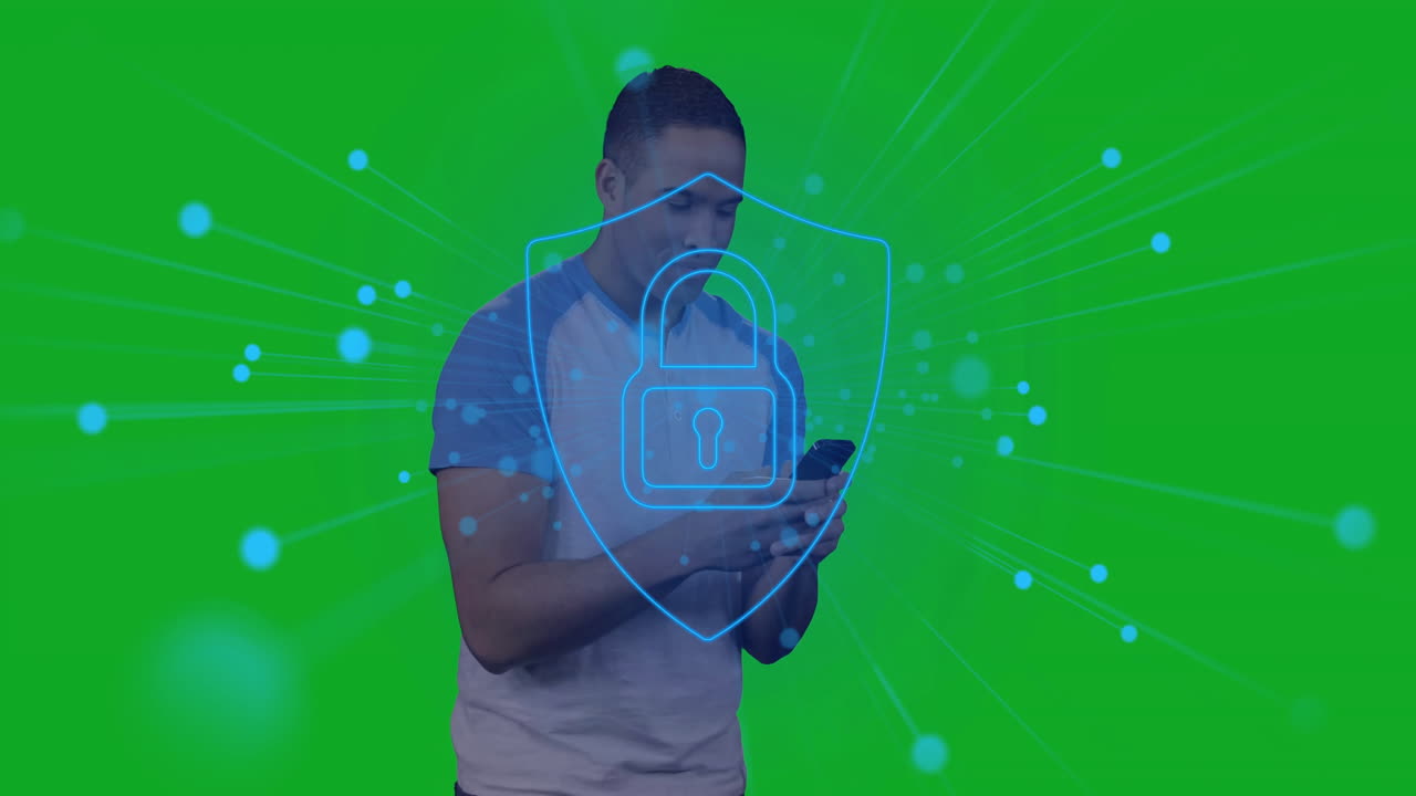 man holding smartphone against green backdrop displaying animated security shield with padlock icon