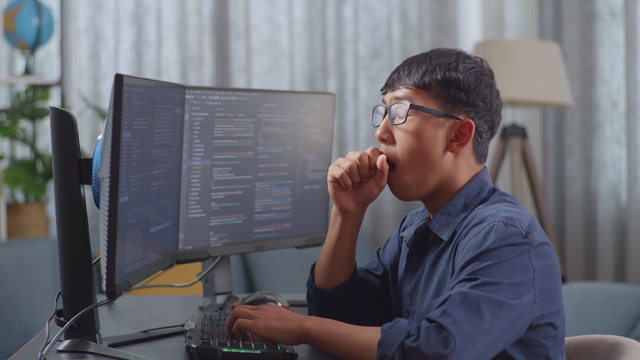 Tired Programmer Working at Home