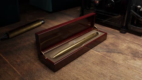 3d animation of an old pen in an elegant looking box