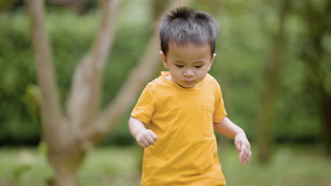 little asian kid outdoors