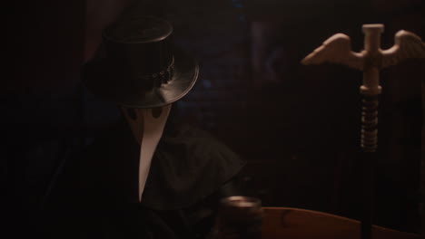 plague doctor in a dark setting