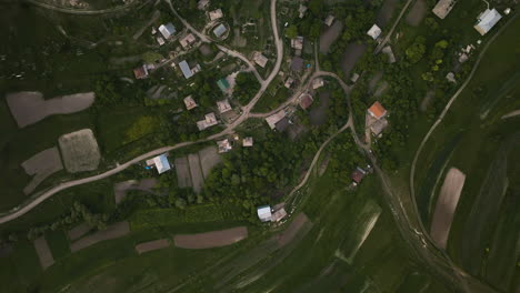 overhead view of small village and rural fields in georgia