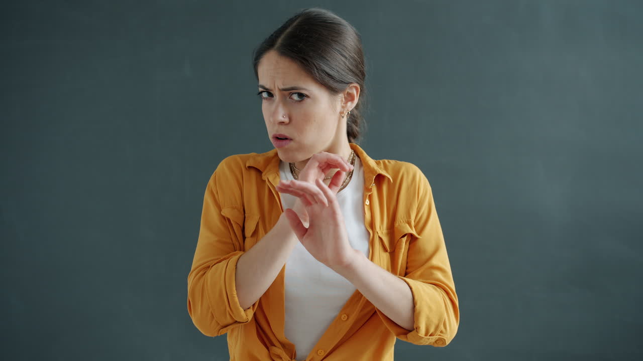 Woman showing disgust and fear