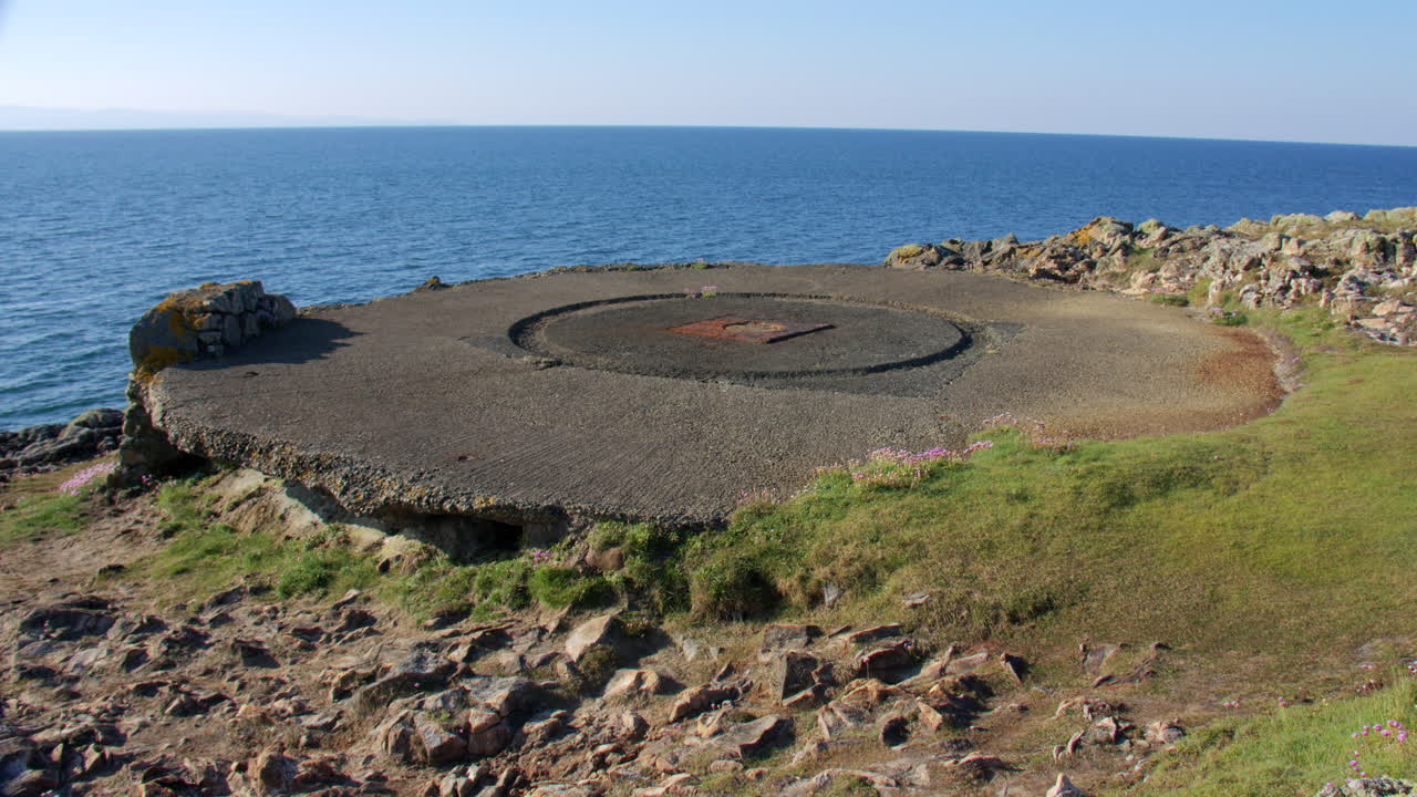 wide shot of Derelict military infrastructure at the headland at Hafan y Môr on Pen-y-chain, Pwllheli