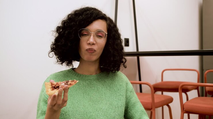 Woman eating fast food