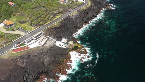 Aerial-View-Of-Holiday-Home-With-Ocean-Scenery-In-Faja-do-Fischer,-Feteira,-Portugal