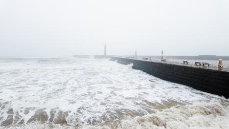 very mist and foggy scene on the coast of the uk