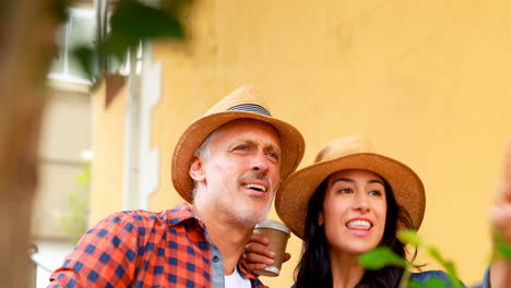 smiling couple drinking coffee