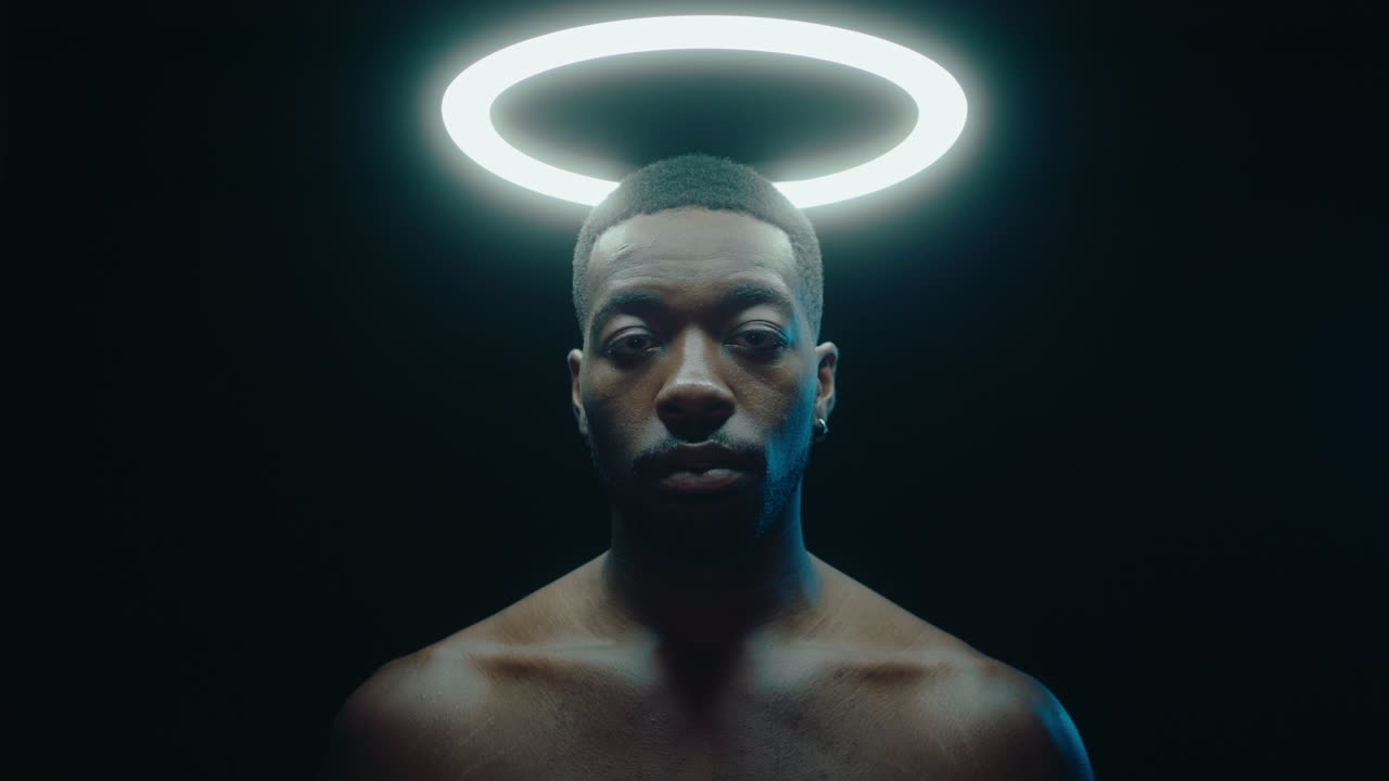 Creative Portrait of Black Man under Ring Light
