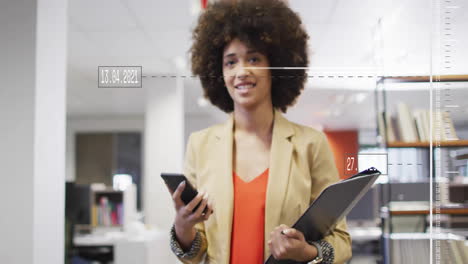 animation of financial data processing over biracial businesswoman in office