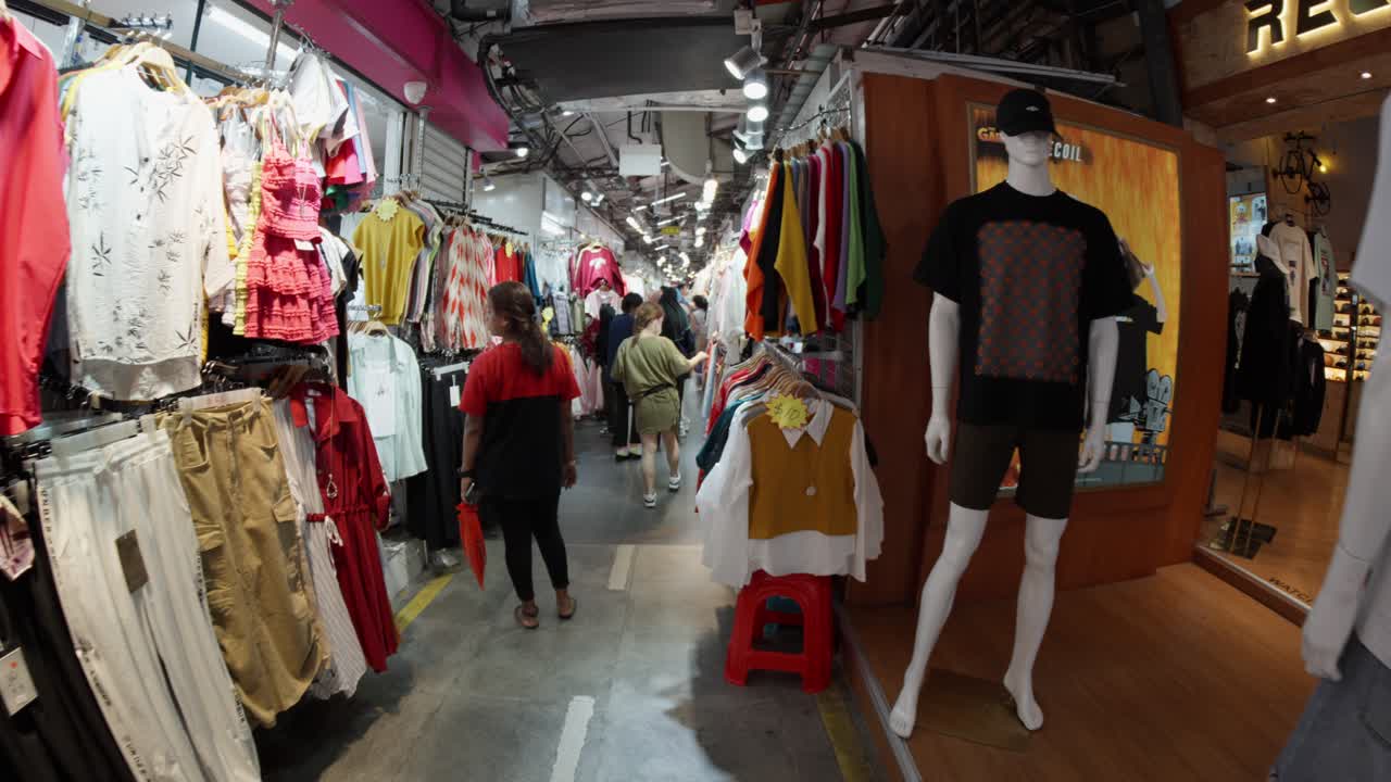 People Inside The Shopping Center Destination In Bugis Street, Singapore. POV Shot
