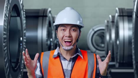 engineer in industrial setting reacts to surprise