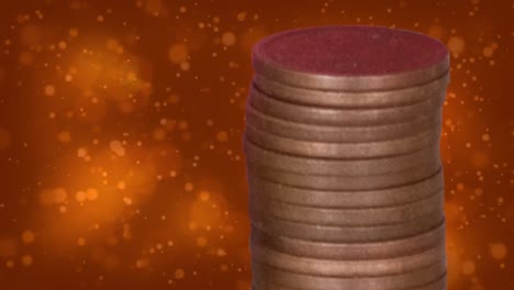 Animation-Von-Punkten-über-Einem-Haufen-Münzen-Auf-Orangefarbenem-Hintergrund