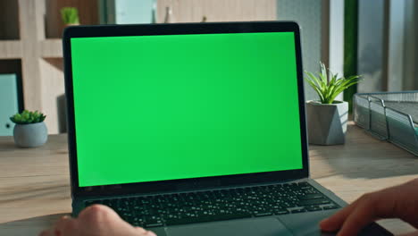 businessman using mockup laptop at morning office close up. unrecognizable man